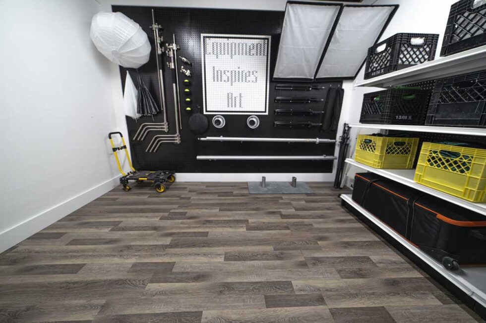 Landscape shot showcasing photography studio newly built equipment room with tons of professional photography equipment available for rent during studio rentals.